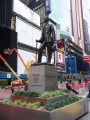 Standing figure (over life size), integral plinth, on pedestal