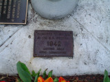 3 plaques on concrete flagstaff