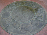 Five medallions embedded at different locations in the walkways