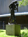 Over life-size group of two figures on pedestal