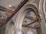 Arcaded structure with decorative ceiling panels of Minton tiles; exterior has carved limestone decorations