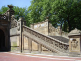 Arcaded structure with decorative ceiling panels of Minton tiles; exterior has carved limestone decorations