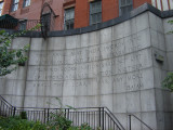 Staircase with curved wall, incised letters