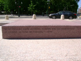 Heroic scale bronze figure, bronze fountain wall, and decorative paving and seating blocks