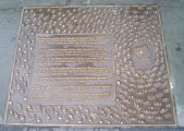 A series of 22 plaques set into the sidewalks surrounding park