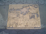 A series of 22 plaques set into the sidewalks surrounding park