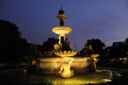 Three-tiered, octagonal fountain with extensive sculptural program of sea creatures, etc.