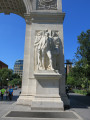 Triumphal arch, with two eagles, spandrel figures, two pier sculptures