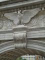 Triumphal arch, with two eagles, spandrel figures, two pier sculptures