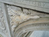 Triumphal arch, with two eagles, spandrel figures, two pier sculptures