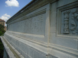 Triumphal arch, with two eagles, spandrel figures, two pier sculptures