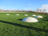 seven cast concrete domes representing the phases of the moon