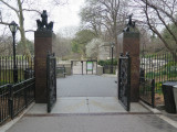 Decorative gate with piers topped with animal groups