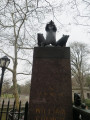 Decorative gate with piers topped with animal groups