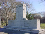 Stele with bas-relief on pedestal on stepped base