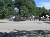 fountain with bronze and wrought iron finial on top a polychrome masonry base