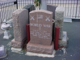 Five steles set in a triangle around a flagstaff