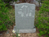 Five steles set in a triangle around a flagstaff