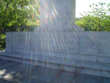 Stele with bas-relief on pedestal on stepped base