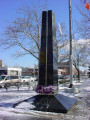 Tapered obelisk on sq. base, incised ltr