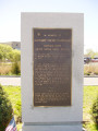 Tablet recessed in granite stele