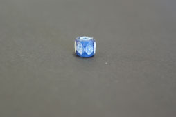 A glass bead dated to the mid- nineteenth century.