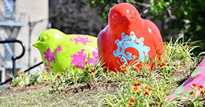 colorful brid sculptures with patterns in the park