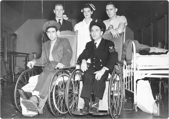 Paralyzed veterans of World War II visit a Parks facility.