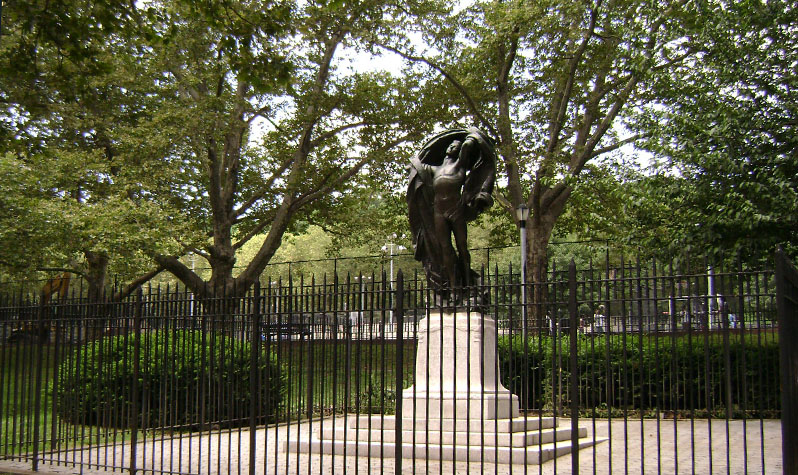 A nude male figure with arms stretched upward holding a large flowing American flag, symbolizing a soldier ascending to heaven.