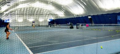 a tennis court under a bubble