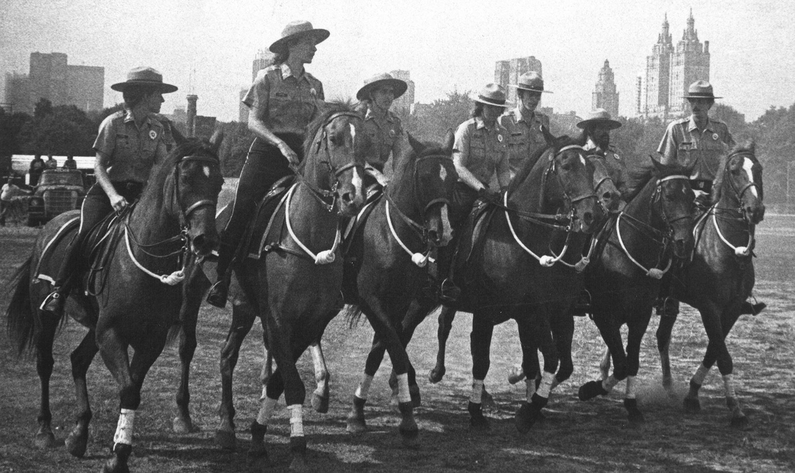 A team of mounted Urban Park Rangers traverse Central Park.