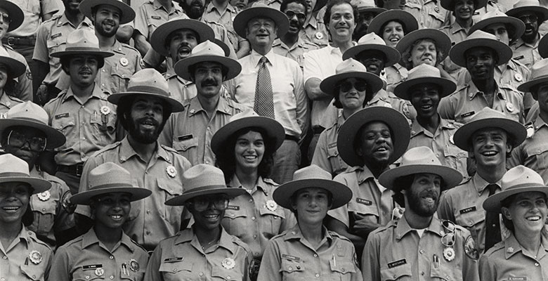 Archival image of the first class of park rangers, former parks commissioner Gordon J Davis, and Mayor Ed Koch