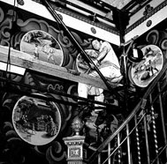 Allen Saalburg painting murals in the Arsenal Lobby, Central Park, (southeast corner, east wall), 1936