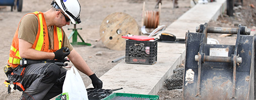 Construction worker at St. Mary's Playground.