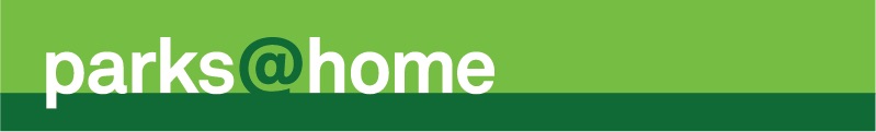 Parks@Home Banner. The words parks at home in white are placed on a green background