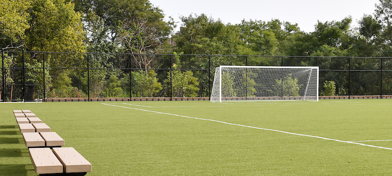 a soccer field in a park