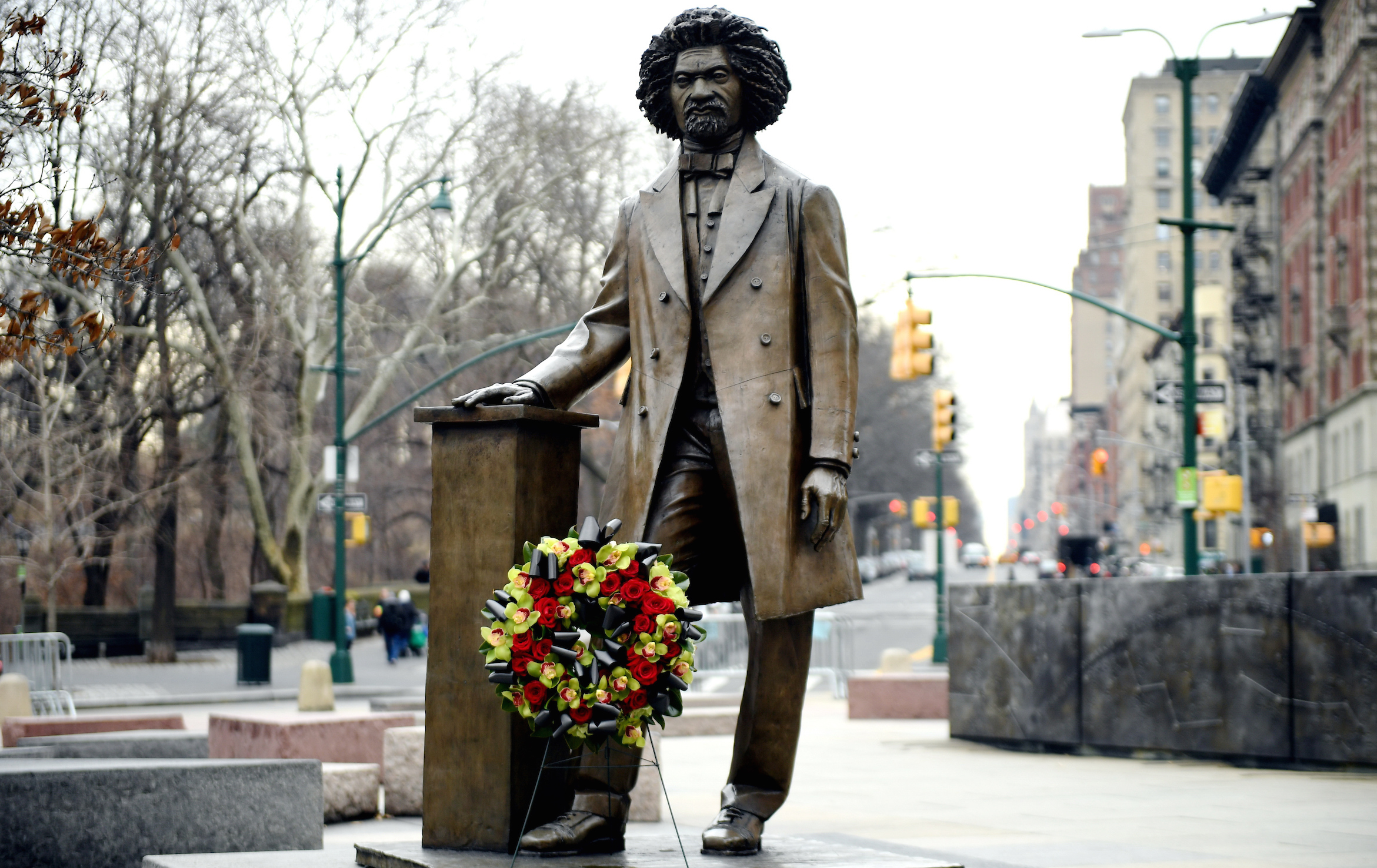 Statue of Frederick Douglass. The hand of the statue rests on a pedestal