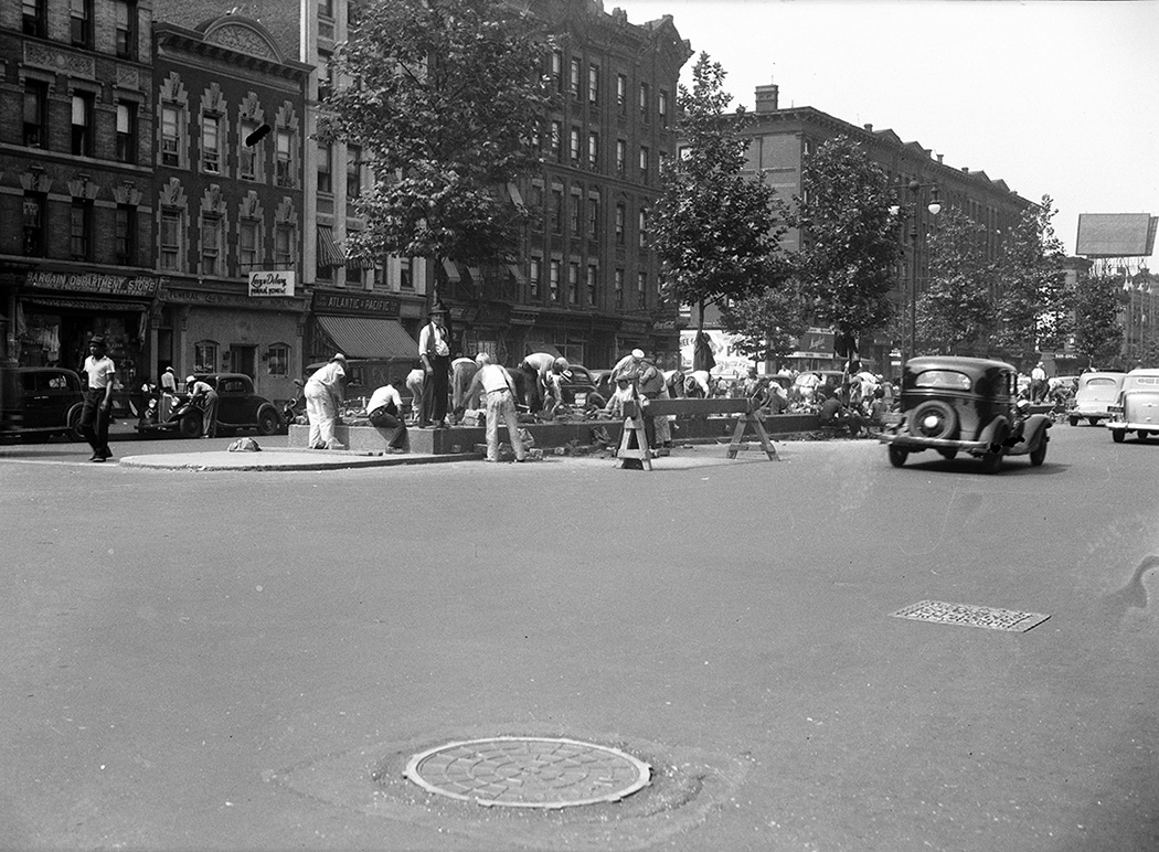 black and white archival photo of the construction workers at the site