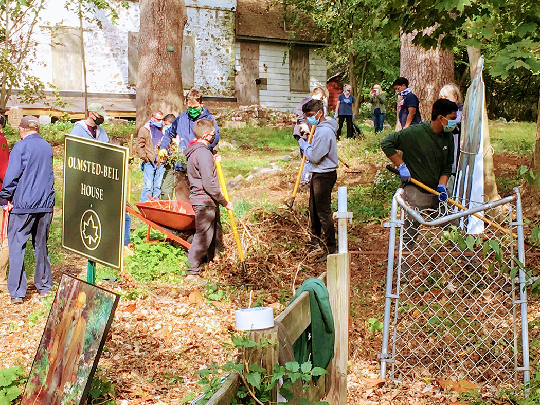 Kids help clean and fix up the park