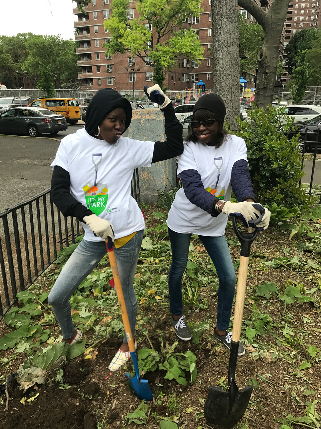 Teen volunteers embrace each other