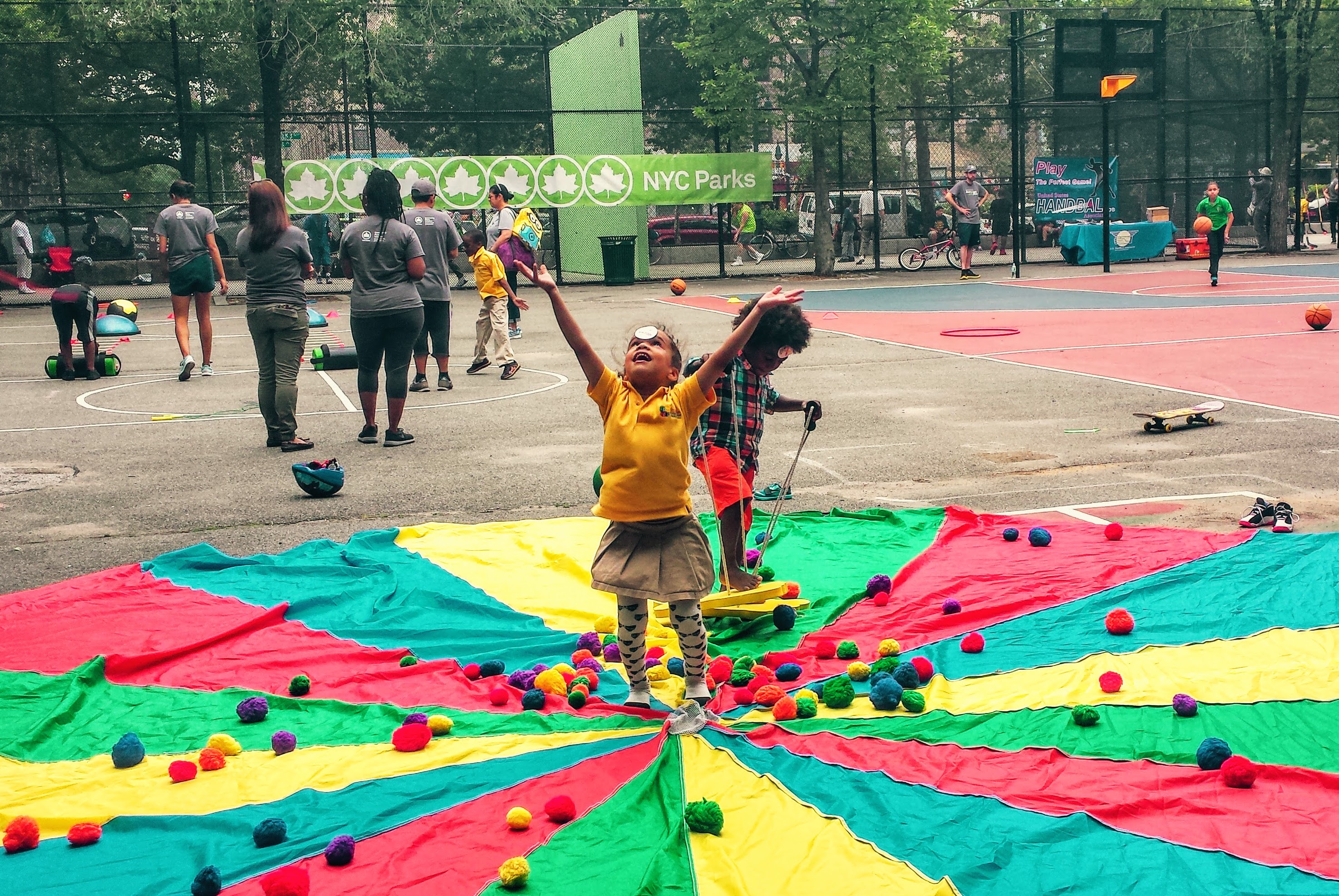 kids enjoy playing at a playground with crafts and basketballs