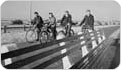 Four teens bike the pedestrian path along the Belt Parkway, December 20, 1941. Photo by Rodney McCay Morgan; Courtesy of Parks Photo Archive, Neg. 21133.