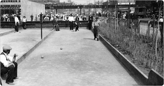 Men enjoy a game of bocce on the courts at 1st Avenue and East Houston, June 5, 1935. Courtesy of Parks Photo Archive, Neg. 1451.