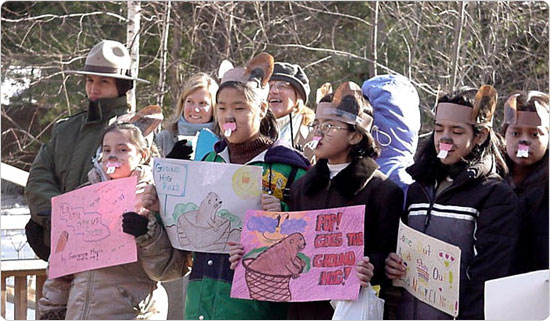 Fans brace the cold weather to greet Flushing Meadows Phil and Corona Kate on February 2, 2000 in Flushing Meadows Corona Park. 