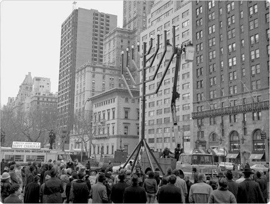 The menorah lighting in Grand Army Plaza by the Lubavitch sect, with then-New York City Mayor Beame, December 1977. Photo by Daniel McPartlin; courtesy of Parks Photo Archive, neg. 41861-5.