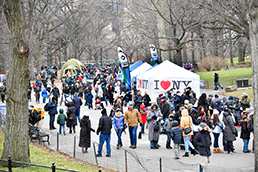 Groups of guests enter the Winter Jam venue in the park