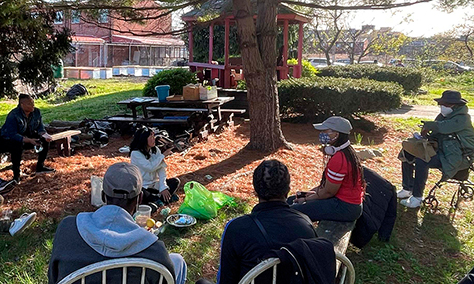 people at a GreenThumb GrowTogether workshop work together.