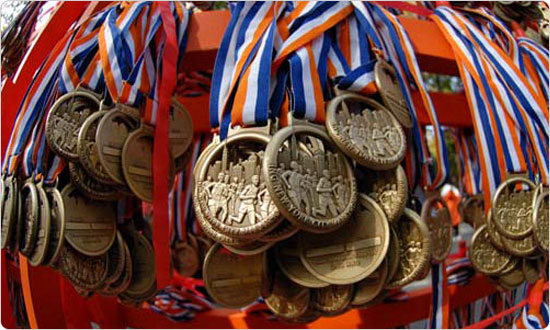 Tens of thousands of marathon medals await the runners at the finish line. Photo: Daniel Avila, November 5, 2006.