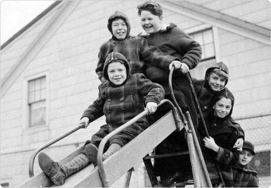 Young boys line up to enjoy Evergreen Park/PS 68?s slide in Queens, January 5, 1953. Courtesy of Parks Photo Archive; Neg. 21952.