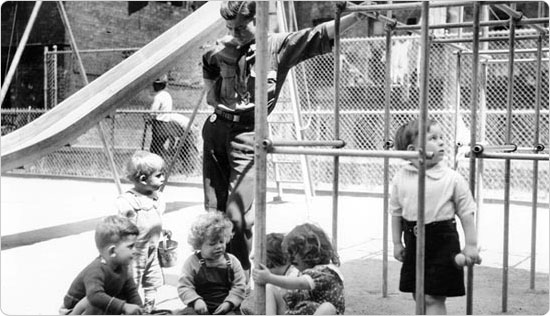 A park supervisor oversees children playing in the Bronx?s Hines formerly St. Augustine Park, circa 1940. Courtesy of Parks Photo Archive; Neg. 17760.